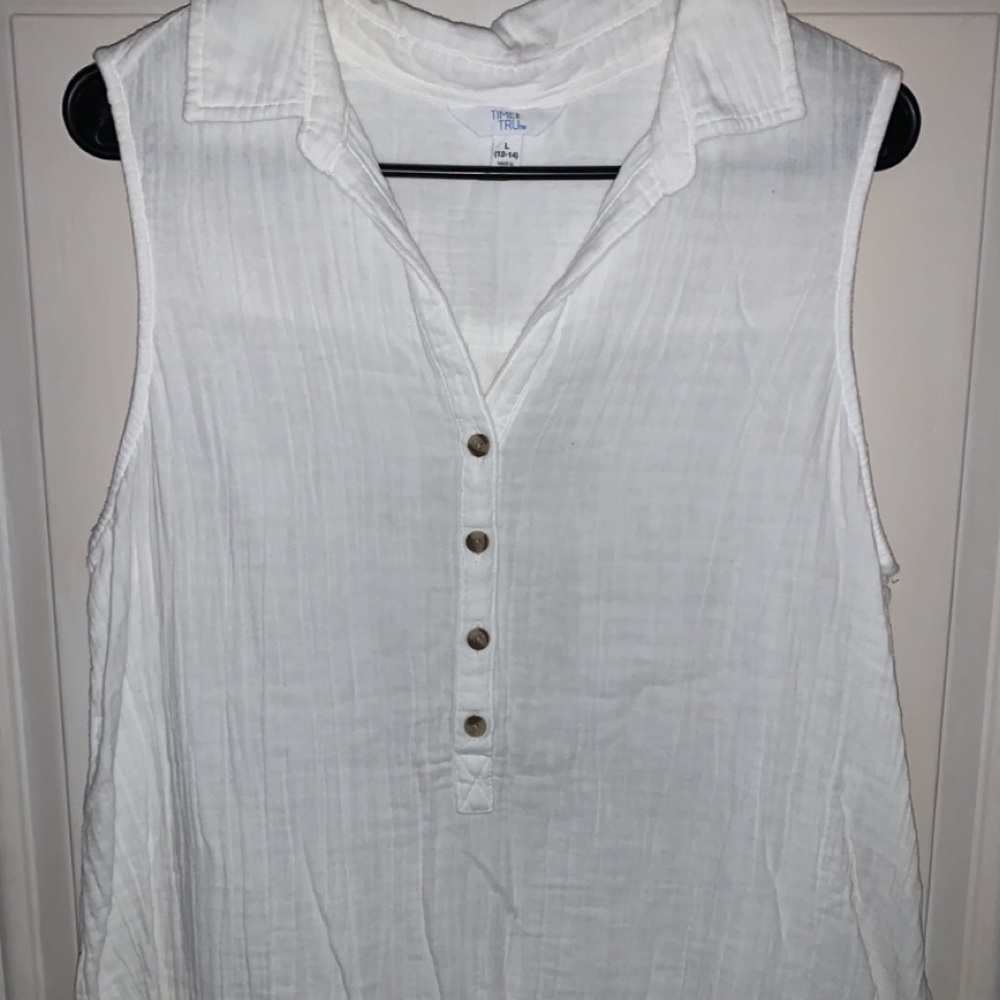 Large white Walmart brand sleeveless shirt